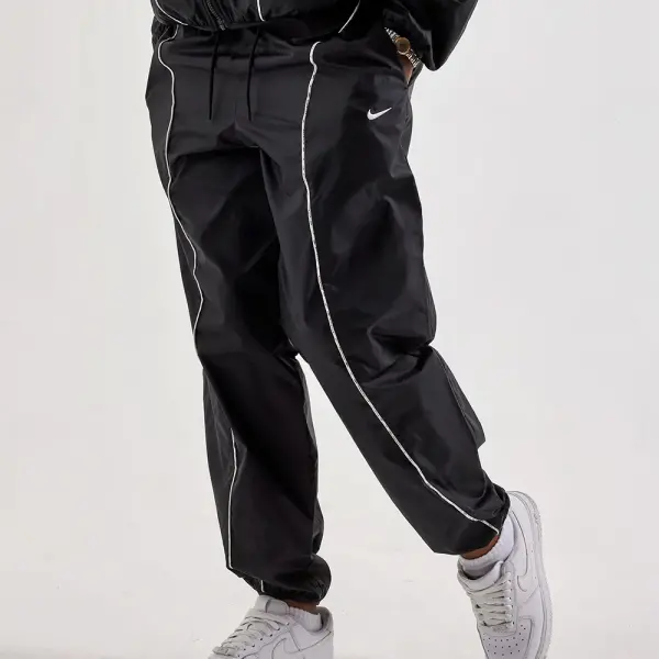 Pantalon deportivo Dama Nike Sportswear Woven Repel